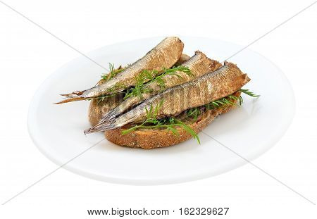 Sprats sandwiches on a plate on isolated on white background