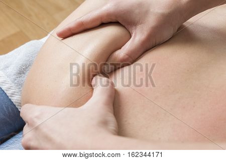 Physiotherapist, Chiropractor Giving A Massage And Stretching Of Subscapularis And Rhomboid