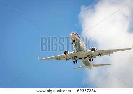 Airplane Approaching The Airport And Landing In Miami