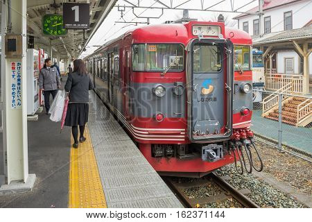 TOKYO, JAPAN - 20 NOV 2016 : Train stopped at Karuizawa Railway station.The railway system is one of the most important public transportation in Japan.