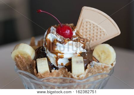 Ice cream with fresh banana and Fruits.