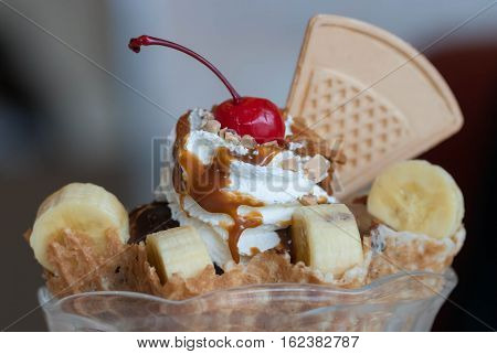 Ice cream with fresh banana and Fruits.