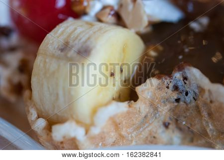 Ice cream with fresh banana and Fruits.