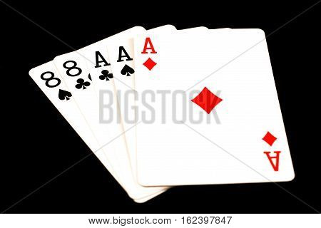 A close up of the dead man's hand poker hand
