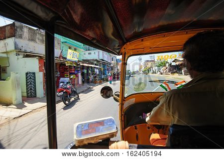 Tuc-tuc driver at work in Kanyakumari, 7 October 2016, Tamil Nadu India