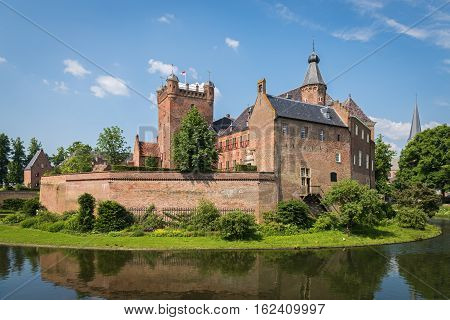 S'HEERENBERG, GELDERLAND/ THE NETHERLANDS - JUNI 4,2016:View of the historical castle Haus Berg in a sunny summer day