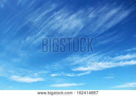 Fantastic soft white clouds against blue sky background