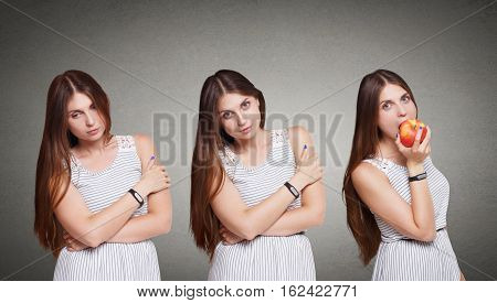 Choose healthy food, eat right, diet concept. Beautiful long-haired young woman decides to eat red apple. Healthy lifestyle.