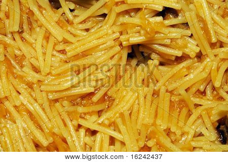 closeup of a bowl of spanish noodles freshly made