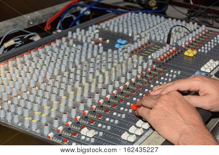 Mixer is controlled and controlled by a producer - close-up