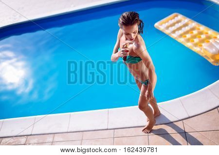 Woman applying sun uv protection lotion at summer