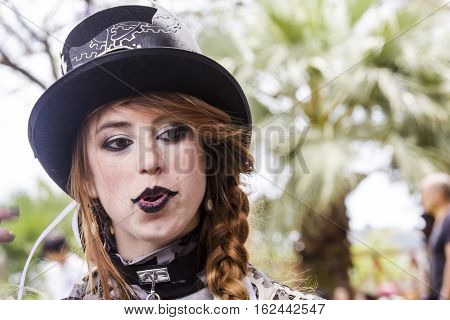 CAGLIARI, ITALY - June 1, 2014: Sunday at La Grande Jatte public gardens - Sardinia - portrait of a beautiful girl in the steampunk costumes