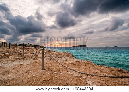 Dramatic sunset at Cala Compte in the winter