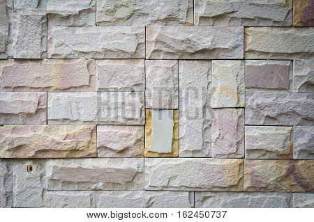 Abstract weathered seamless texture stained old stucco light gray and aged paint white brick wall background in rural room grungy rusty blocks of stonework technology. High resolution white brick