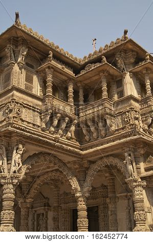 AHMADABAD, INDIA - OCTOBER 30, 2007: Ornately carved stonework of the entrance to the Hutheesing Temple in Ahmadabad, Gujarat, India. Jain temple built circa 1848.
