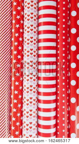 Cheerful background made from rolls of colorful wrapping paper