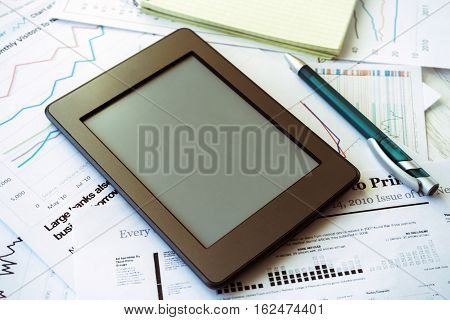 Workplace in office epad ebook and graphs