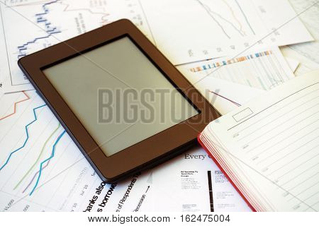 Workplace in office epad ebook and graphs