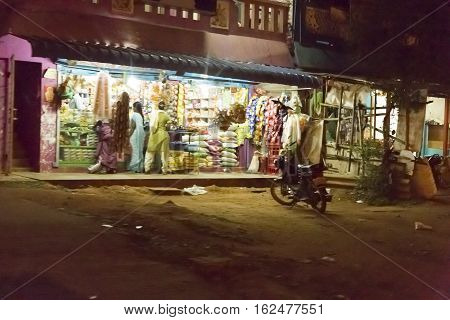 Illustrative image. Pondicherry, Tamil Nadu, India - Marsh 10, 2014. Village and city by night in India area. Life during the night.