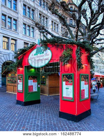 Zurich, Switzerland - 19 December, 2016: entrance to the Christmas market from Uraniastrasse street. Zurich is the largest city in Switzerland and the capital of the Swiss canton of Zurich.