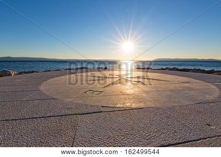 Beautiful sundown on the Tucepi town beach.