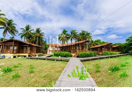 Cayo Guillermo island, Sercotel resort, Cuba, July 4, 2016, beautiful inviting gorgeous, view of hotel grounds with bungalow cozy, comfortable houses standing near the beach area in tropical garden