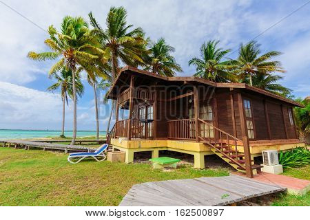 Cayo Guillermo island, Sercotel resort, Cuba, July 4, 2016, beautiful inviting gorgeous, stunning view of hotel grounds with bungalow cozy, comfortable houses standing on the beach with ocean view
