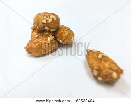 Peanut coat sugar on the white background