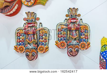 AMBALANGODA SRI LANKA - DECEMBER 5 2016: The Maha Kola Masks holding the victims in their hands and surrounded by 18 demons of illness can be used in ritual Devil Dance on December 5 in Ambalangoda.