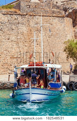 Spinalonga, Greece - July 31, 2012:  The Excursion Boat Took A Group Of Tourists To Visit  Spinalong