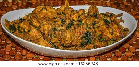 Indian Chicken curry with spices and masala