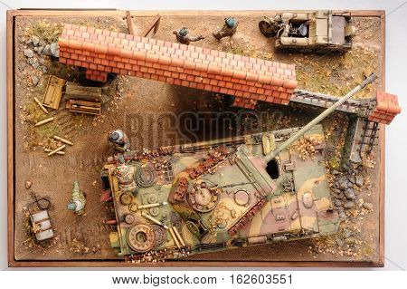Two german officers conversation in front of european yard. World War 2 time. Miniature. Top view