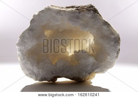 Display specimen of a a large quartz crystal geode. This one used in traditional healing.