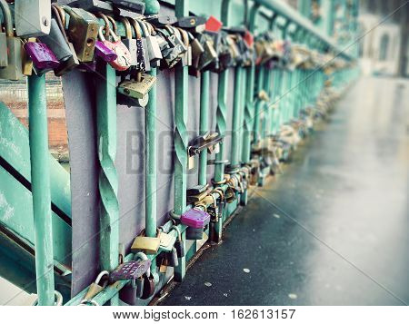 Lots of locks on a bridge close up