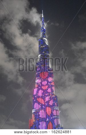DUBAI, UAE - DEC 9: The LED lights show at Burj Khalifa in Dubai, UAE, as seen on Dec 9, 2016. The show titled Ascension, by London-based Yusuke Murakami and Tangent Design and Invention illuminated and animated the Burj Khalifa during Dubai Design Week.