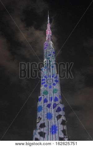 DUBAI, UAE - DEC 9: The LED lights show at Burj Khalifa in Dubai, UAE, as seen on Dec 9, 2016. The show titled Ascension, by London-based Yusuke Murakami and Tangent Design and Invention illuminated and animated the Burj Khalifa during Dubai Design Week.