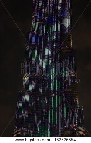 DUBAI, UAE - DEC 9: The LED lights show at Burj Khalifa in Dubai, UAE, as seen on Dec 9, 2016. The show titled Ascension, by London-based Yusuke Murakami and Tangent Design and Invention illuminated and animated the Burj Khalifa during Dubai Design Week.