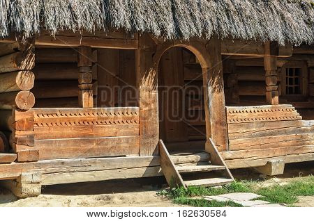 Lviv Ukraine - September 09 2016: Entrance of ancient Ukrainian wooden house from Boyko's region Ukraine. Now in Folk Architecture museum in Lviv