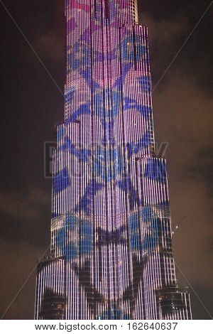 DUBAI, UAE - DEC 9: The LED lights show at Burj Khalifa in Dubai, UAE, as seen on Dec 9, 2016. The show titled Ascension, by London-based Yusuke Murakami and Tangent Design and Invention illuminated and animated the Burj Khalifa during Dubai Design Week.