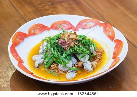 Spicy Oysters Salad with Young Tamarind Leafs