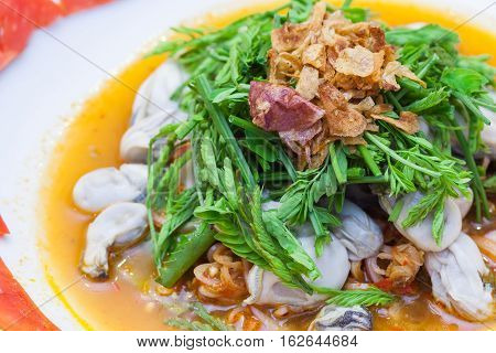 Spicy Oysters Salad with Young Tamarind Leafs