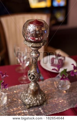 metall candlestick, red wedding decor, table of newly married