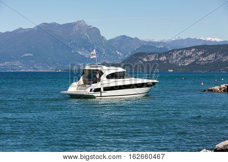 LAZISE ITALY - APRIL 30 2016: Luxury speed boat on Garda Lake. Italy