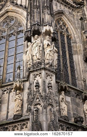 Stone figures from the facade of Aachen Cathedral, Germany
