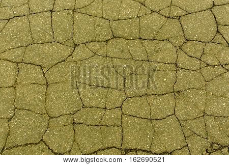 Yellow Toned Damaged Asphalt Texture.