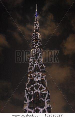 DUBAI, UAE - DEC 9: The LED lights show at Burj Khalifa in Dubai, UAE, as seen on Dec 9, 2016. The show titled Ascension was created by London-based Yusuke Murakami and Tangent Design and Invention.