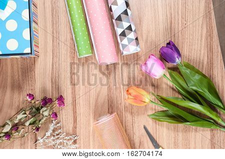 florist desktop with working tools and materials
