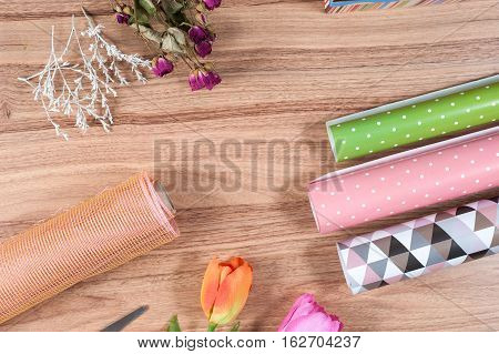 florist desktop with working tools and materials