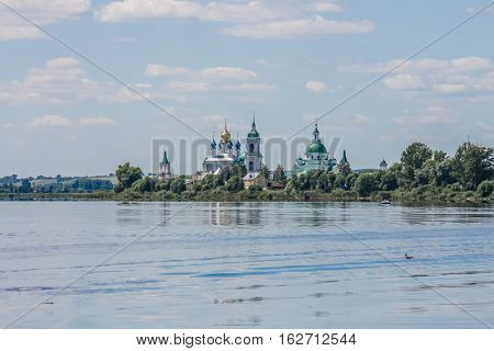 Orthodox Monastery Stands On The Shore Of The Lake