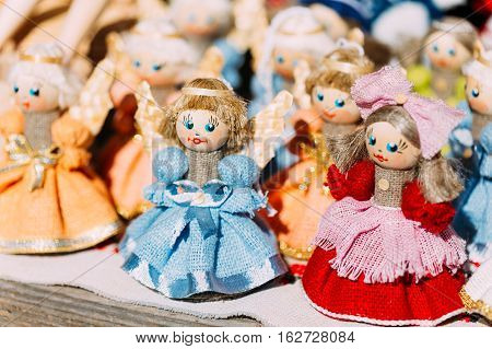 Colorful Belarusian Straw Dolls At Local Market. Straw Dolls Are Most Popular Souvenirs From Belarus And Symbol Of Country's Culture